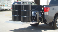 G2-Series pickup liftgate lifting two oil drums