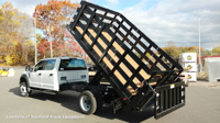 G2-Series liftgate on a stake side dump truck