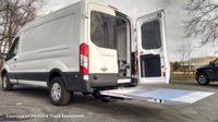 Cantilever Series liftgate in up position on Nissan NV Commercial Van