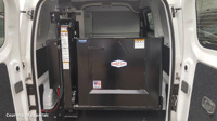 650 Series liftgate stored in a compact commercial van