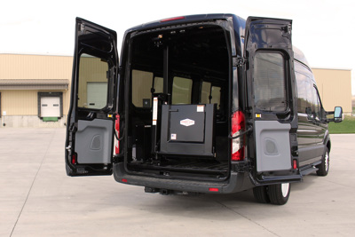 A 2015 Ford Transit Cargo Van with an installed Tommy Gate 650 Series Liftgate